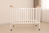 Modern Mobile Baby Crib with Safety Locks & Stylish Design